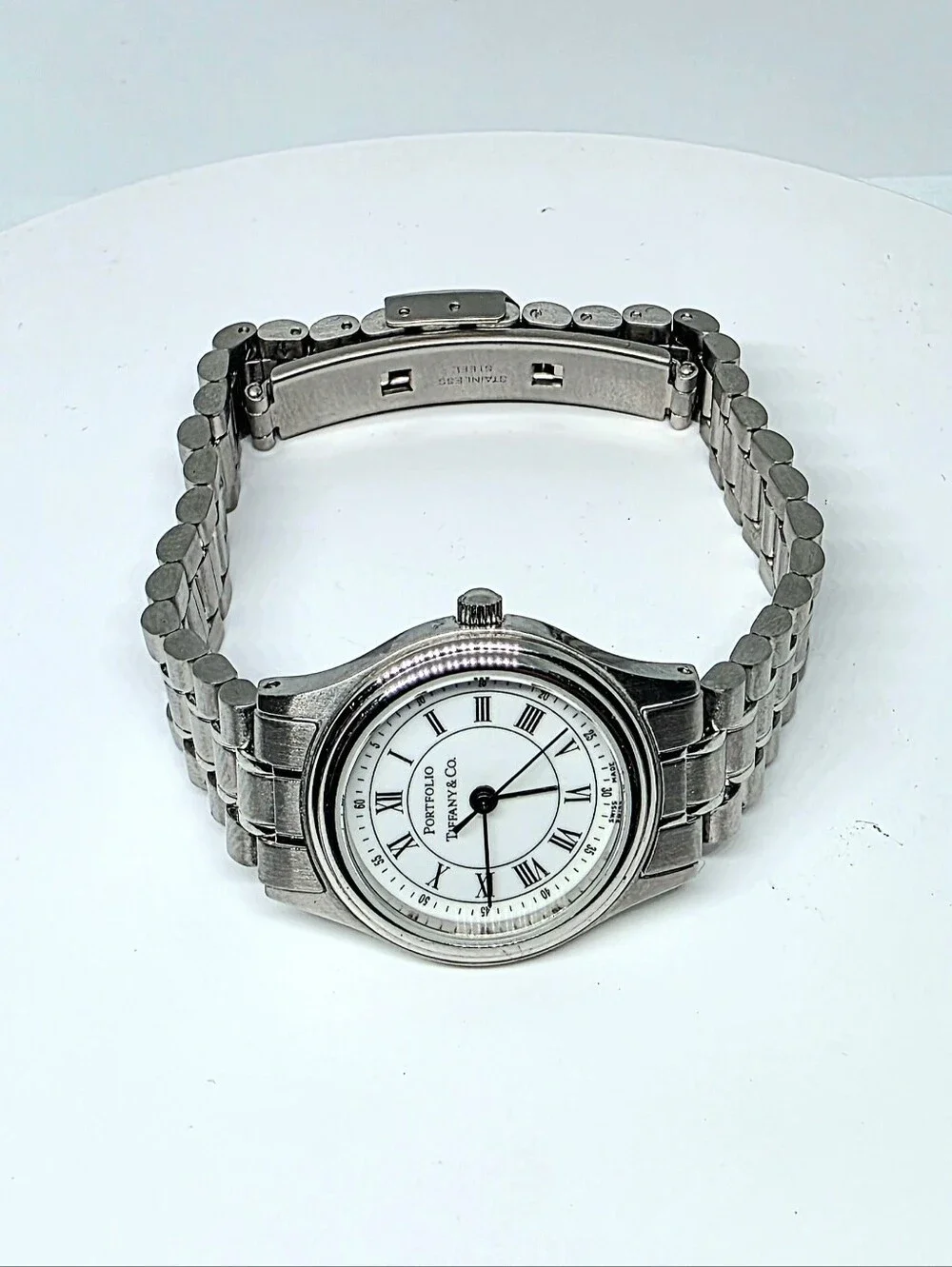 Tiffany & Co. Portfolio Stainless Steel Quartz Watch (Pre-loved) with its origin